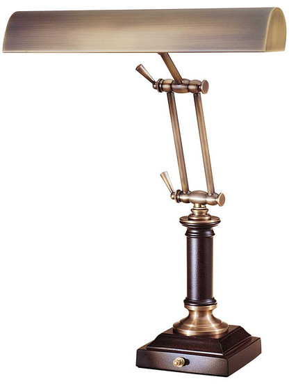 16 1/2 inch Piano Desk Lamp with Decorative Base in Antique Brass.
